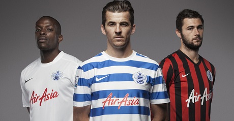 Austin models QPR's new kits along with Joey Barton and Nedum Onuoha