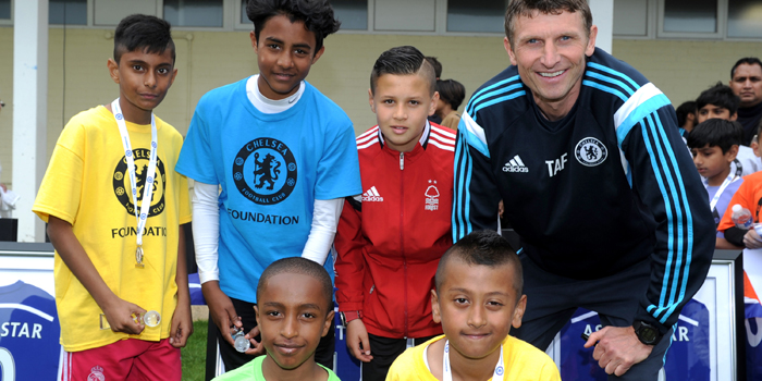The winners along with Sam Khan (centre) and Tore Andre Flo after the Asian Stars event at Cobham Training Ground