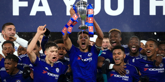 Chelsea's Jake Clarke-Salter lifts the FA Youth Cup in celebration after the FA Youth Cup Final, Second Leg at Stamford Bridge, London.
