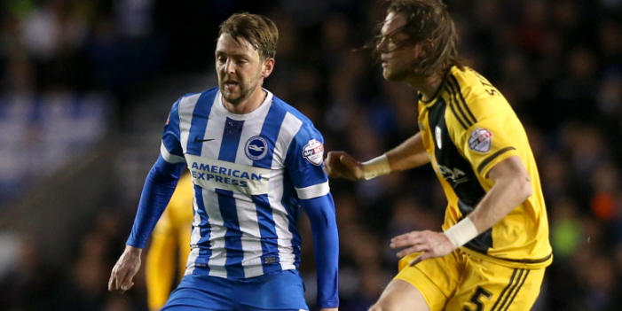 Brighton and Hove Albion's Dale Stephens and Fulham's Richard Stearman (right) in action during the Sky Bet Championship match at the AMEX Stadium, Brighton.