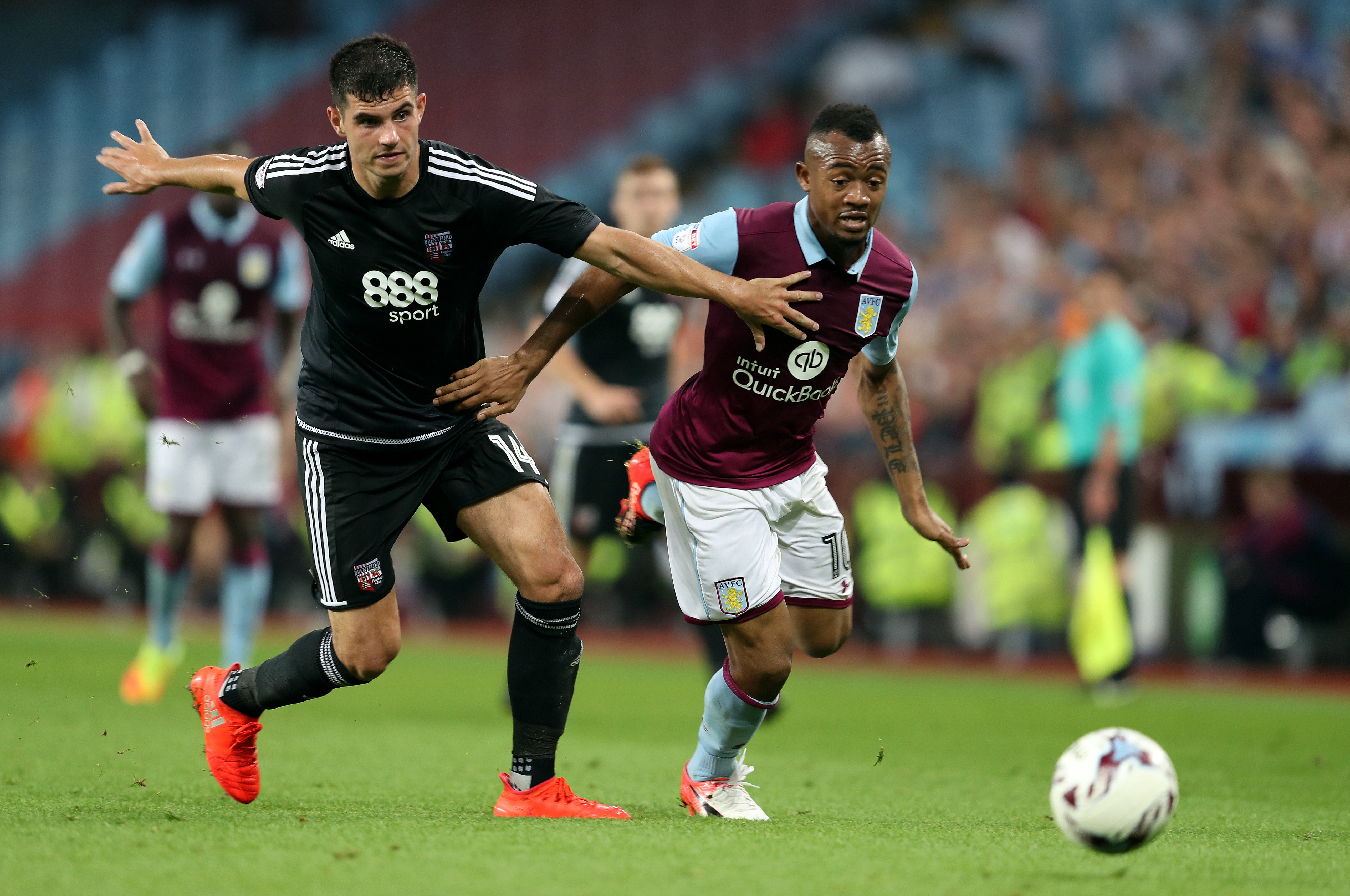 Aston Villa's Joradn Ayew gets past Brentford's John Egan during the Sky Bet Championship match at Villa Park, Birmingham.