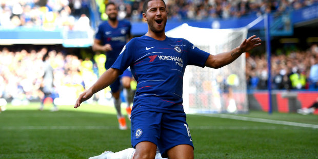 Hazard hat-trick takes Chelsea top